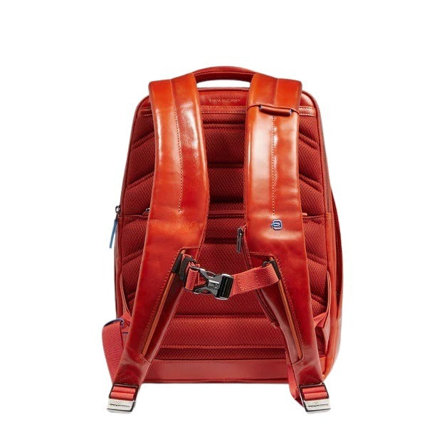 Blue Piquadro 14-inch square laptop backpack with padded compartments, unisex design, and durable zaino style.