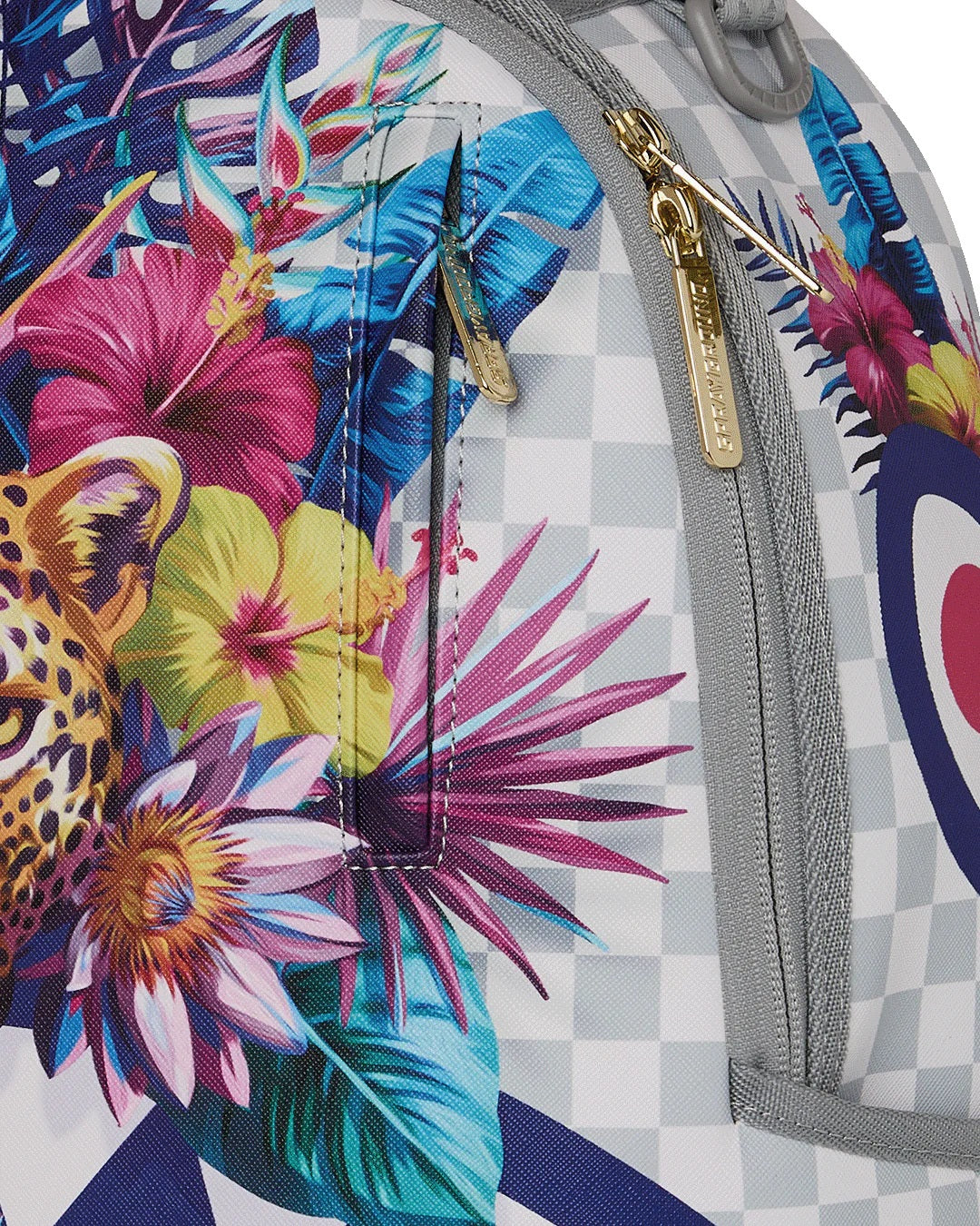 Cream flowering jungle shark Sprayground unisex backpack with vibrant floral and shark design, stylish and functional accessory.