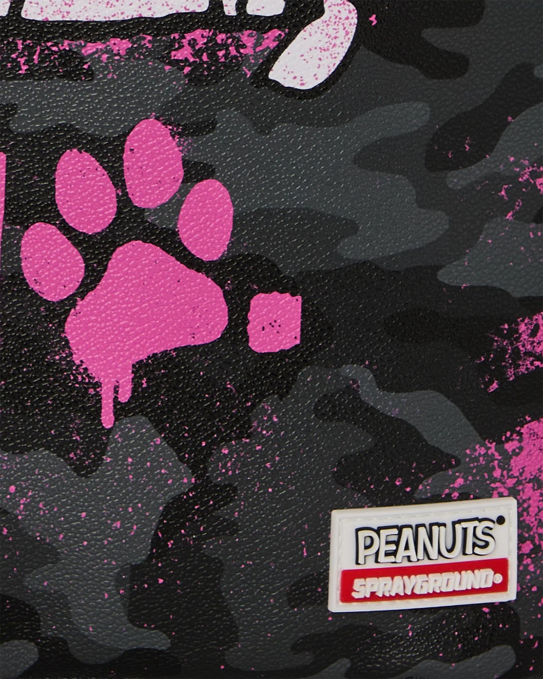 Pink Snoopy Peanuts stencil backpack by Sprayground, unisex accessory with cartoon character design and adjustable straps.